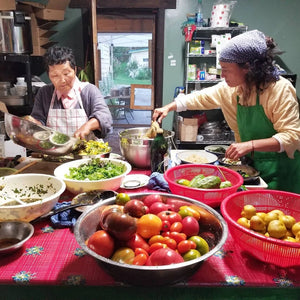 Madyln Warren and her mom G cook with fresh vegetables grown from their farm East Branch.  